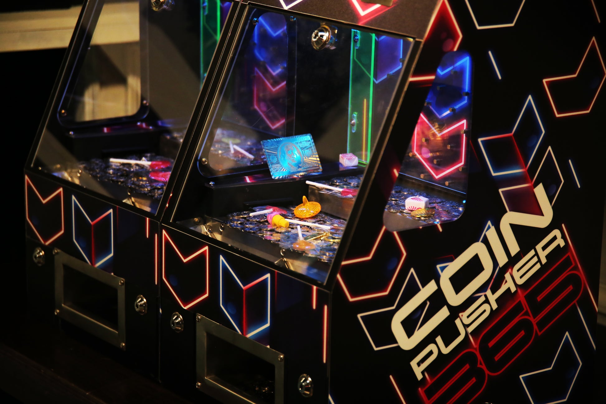 Two Coin Pusher 365 machines on side view